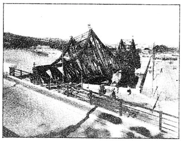 Photo Caption: Wrecked railroad bridge across Soane river at Lyon, France.